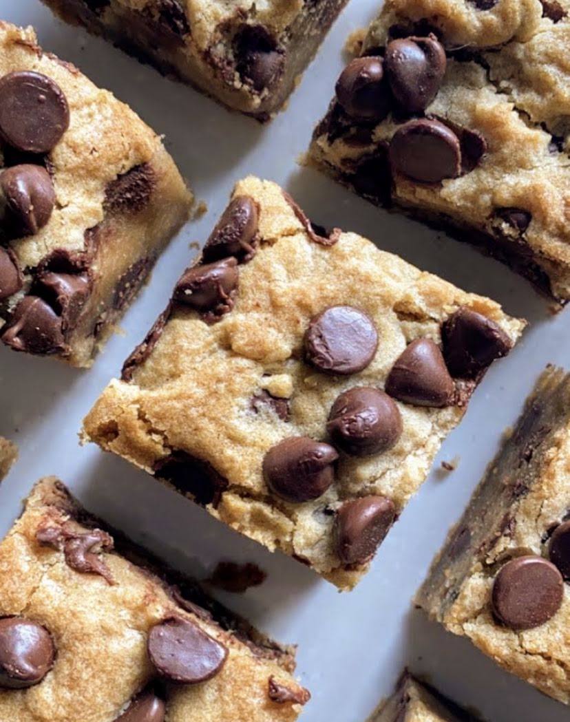 Cookie bar squares on a baking sheet. 