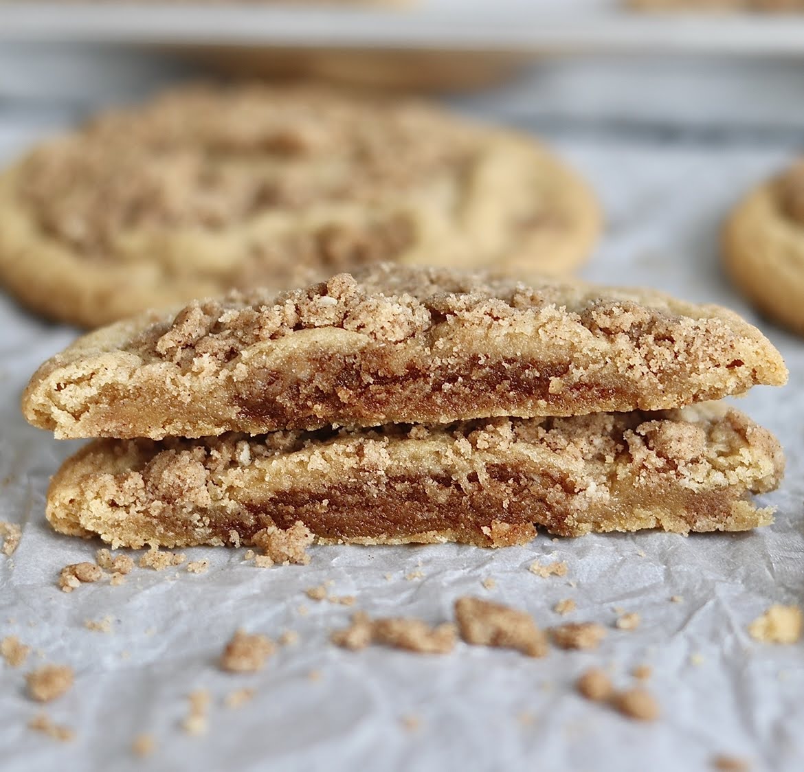 Cross section of stacked coffee cake cookies showing the cinnamon filling. 