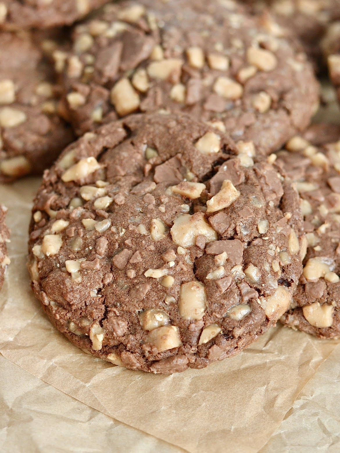 close up view of a chocolate caramel toffee cookie