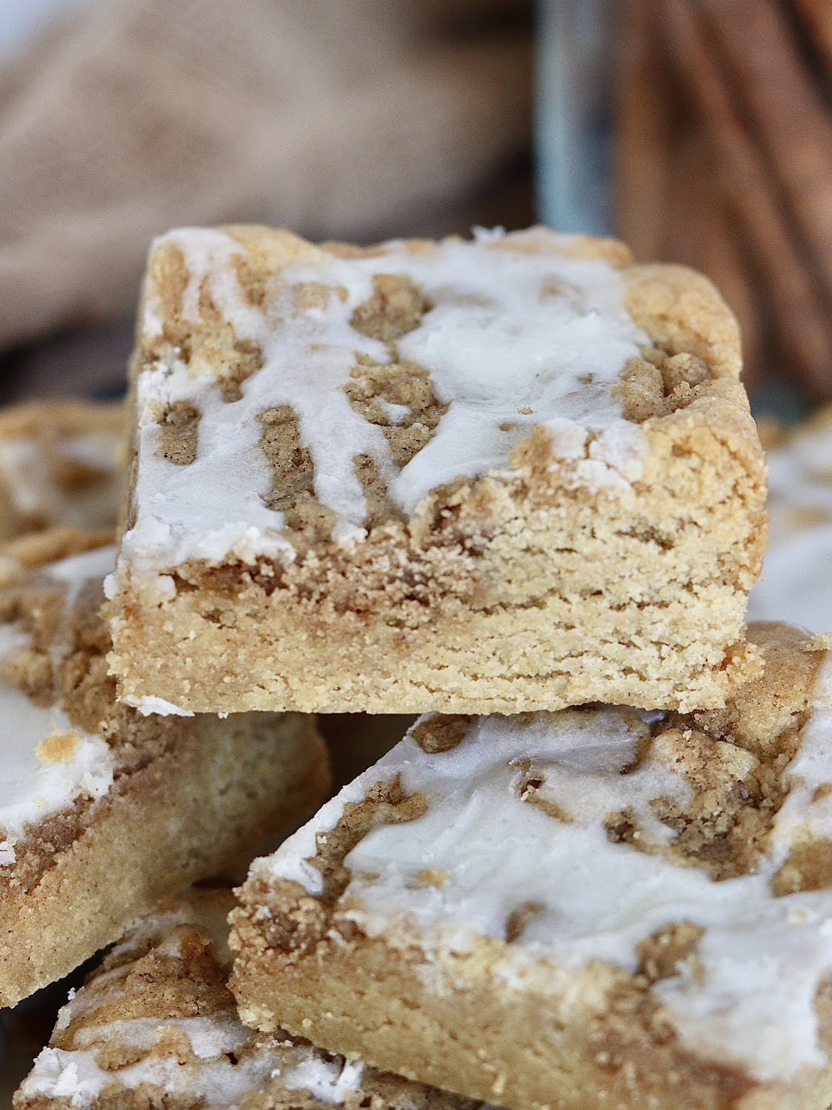 A close up of a slice of cinnamon roll bar
