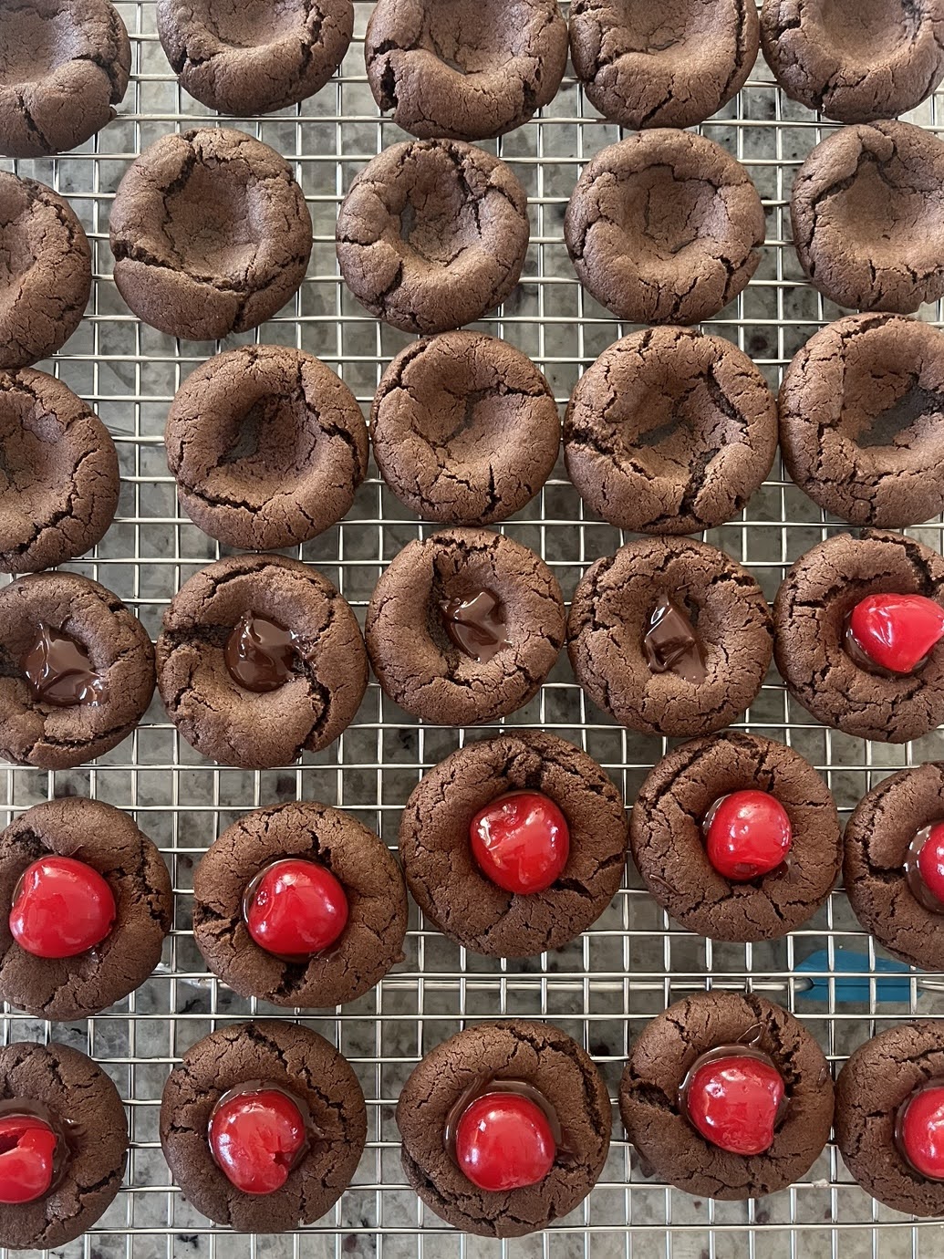 A process photo of assembling the chocolate covered cherry cookies.